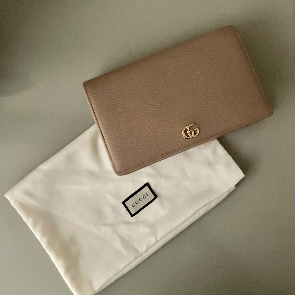 Gucci nude wallet on gold chain with mirror. Comes with dust bag.
